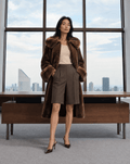 Le Junot Chocolat worn, brown faux fur coat with hazel collar and cuffs